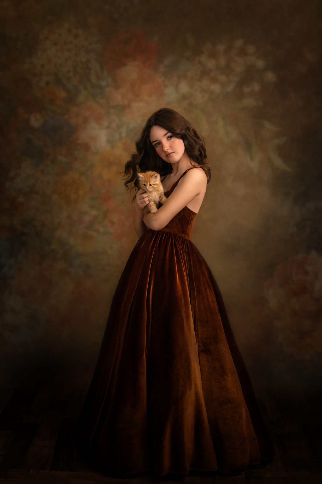 Fine art portrait of girl with kitten